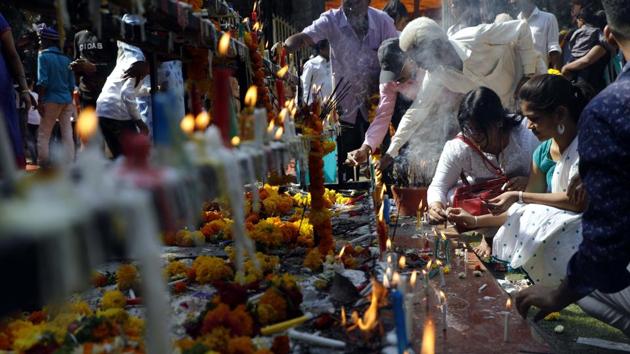 On Ambedkar Jayanti, people remember BR Ambedkar and his contribution to the making of India and also the efforts to curb social discrimination against Dalits. Several functions have been organized throughout the country on Sunday. Floral tributes were paid at Babasaheb’s Statue at Pune railway station on Sunday. (RAHUL RAUT/HT PHOTO)