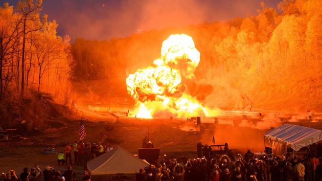 An explosion goes off at the start of the night shoot. Winters said gun enthusiasts from other countries come to Knob Creek “just to play.” “Because they don’t have those abilities,” he said. “They don’t have those rights.” The next machine gun shoot takes place in October. (Andrew Caballero-Reynolds / AFP)