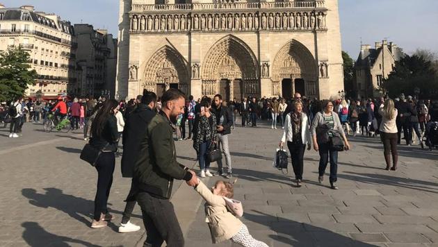 Tourist Brooke Windsor, 23, says she took the picture about an hour before the blaze ripped through the Paris landmark’s main stone structure.(Twitter/@brookeawindsor)