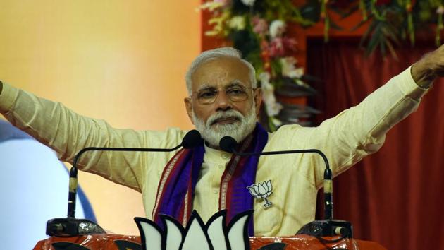 Prime Minister Narendra Modi addresses the audience during an election rally, in Bhubaneswar, Odisha, on Tuesday, April 16, 2019.(Arabinda Mahapatra / HT Photo)