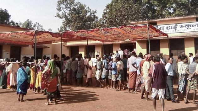 People wait to cast their votes at a polling station at Mangnar during the first phase of Assembly elections in Chhattisgarh. (PTI) People wait to cast their votes at a polling station at Mangnar during the first phase of Assembly elections in Chhattisgarh. (PTI)