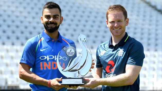 File image of India captain Virat Kohli with England skipper Eoin Morgan. (Getty Images) File image of India captain Virat Kohli with England skipper Eoin Morgan. (Getty Images)