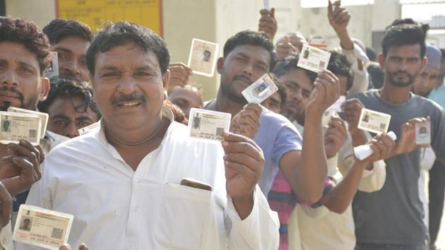 Ghaziabad, India-April 11, 2019: Voters stand in a queue to cast their votes during the first phase of the Lok Sabha elections, at Usman Ghari, Dasna, in Ghaziabad , India, on Thursday, April 11 , 2019. (Photo by Sakib Ali /Hindustan Times)