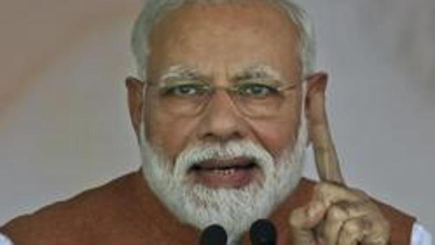 Indian Prime Minister Narendra Modi addresses an election campaign rally of his Bharatiya Janata Party (BJP) in Meerut, India, Thursday, March 28, 2019. India's general elections will be held in seven phases starting April 11. (AP Photo/Altaf Qadri)(AP)