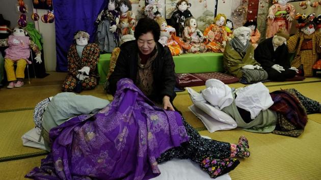 It all started 16 years ago when the dexterous Ayano created a scarecrow dressed in her father’s clothes to prevent birds eating the seeds she had planted in her garden. “A worker who saw it in the garden thought it really was my father... he said hello but it was a scarecrow. It was funny,” recalled Ayano. (Kazuhiro Nogi / AFP) 