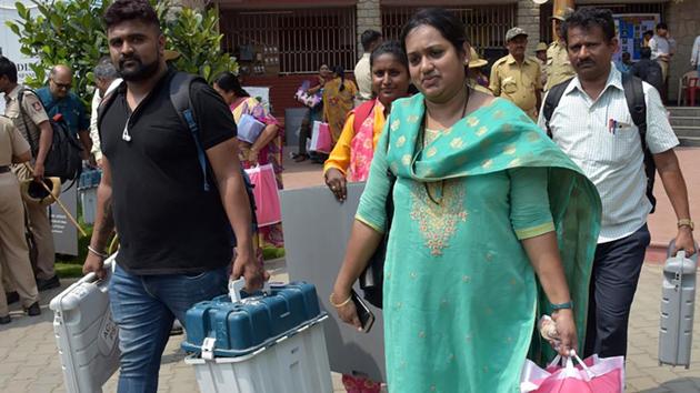 Polling officials carrying EVMs and other necessary equipment required for the Lok Sabha Elections 2019. (ANI Photo) Polling officials carrying EVMs and other necessary equipment required for the Lok Sabha Elections 2019. (ANI Photo)