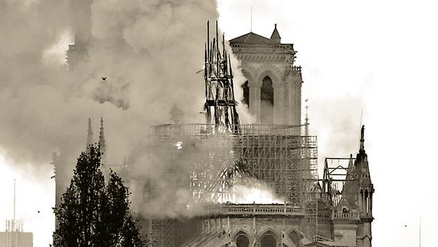 The burning spire on the roof of the Notre-Dame Cathedral, Paris, April 15. More than a church has fallen. In a way, Notre Dame is the soul of humanity itself, and a piece of that humanity has now been scarred(REUTERS)