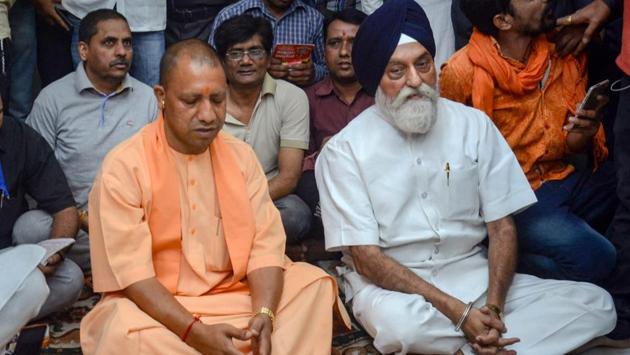 Uttar Pradesh Chief Minister Yogi Aditynath offers prayers at Hanuman temple, in Lucknow. Adityanath is serving a 72-hour ban from poll campaigning imposed by the Election Commission for violation of the Model Code of Conduct. But the chief minister is not falling behind in sending his message across. (PTI File) Uttar Pradesh Chief Minister Yogi Aditynath offers prayers at Hanuman temple, in Lucknow. Adityanath is serving a 72-hour ban from poll campaigning imposed by the Election Commission for violation of the Model Code of Conduct. But the chief minister is not falling behind in sending his message across. (PTI File)