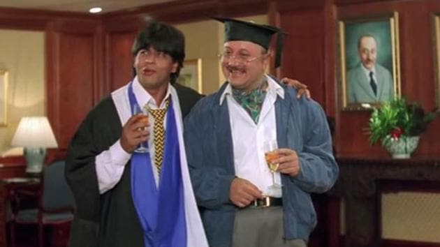 Anupam Kher and Shah Rukh Khan in a still from Dilwale Dulhania Le Jayenge.