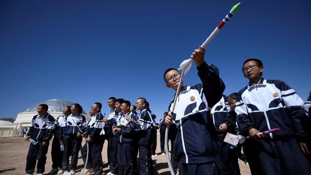 Students during their visit to ‘Mars Base 1’. It follows a similar Mars “village” that opened last month in the Qaidam Basin of neighbouring Qinghai -- a brutally hot and dry region which is the highest desert in the world, considered the best replica of Mars’ surface conditions. (Wang Zhao / AFP)