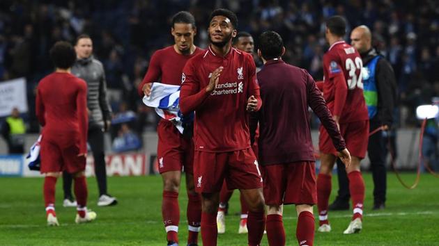 Liverpool's English defender Joe Gomez celebrates at the end of the UEFA Champions League quarter-final second leg football match between FC Porto and Liverpool at the Dragao Stadium in Porto on April 17, 2019(AFP)