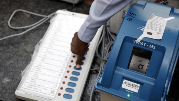 Pune, India - January 17, 2019: State election commission and Their Pune district officials organised a public awareness drive about VVPAT machine at many places around the city. People gathered in large numbers at J M road to see the demonstration of the same in Pune, India, on Thursday, January 17, 2019. (Photo by Rahul Raut/HT PHOTO)