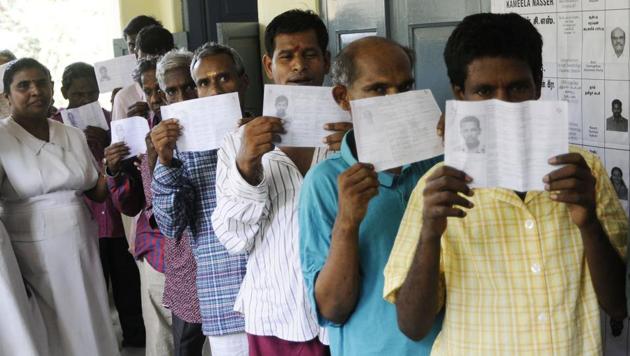 Inmates of the Institute of Mental Health, stands in a queue to cast their vote for the first time in history of the Indian Election in Chennai on Thursday.(ANU photo)
