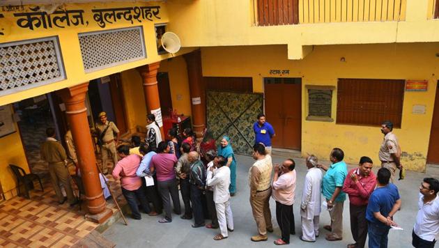 Polling underway at Upper Kot in Bulandshahr, Uttar Pradesh early in the morning. Thirty-eight of 39 Lok Sabha seats of Tamil Nadu are up for the grab in Thursday’s polling. 14 seats in Karnataka, 10 in Maharashtra, eight in Uttar Pradesh, five each in Assam, Bihar and Odisha, three each in Chhattisgarh and West Bengal, two in Jammu and Kashmir and one seat each in Manipur and Puducherry. (Vipin Kumar / HT Photo)