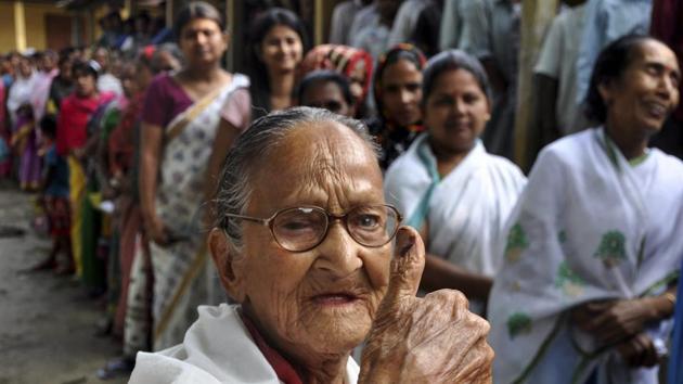 An elderly voter shows her finger marked with indelible ink after casting vote at Kamalpur in Kamrup district, Assam. Voters in Assam’s Silchar complained of the VVPAT malfunctioning soon after polling began. In Uttar Pradesh, EVMs glitches were reported from Agra, Mathura and Hathras. (PTI)