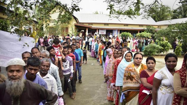 Voters stand in a queue at a polling station to cast their vote in Nagaon. At 11 am, the voter turn for the second phase of Lok Sabha elections 2019 stood at 18.97% in Bihar, 30.62% in Tamil Nadu, 26.39% in Assam, and 26.2% in Chhattisgarh. (PTI)