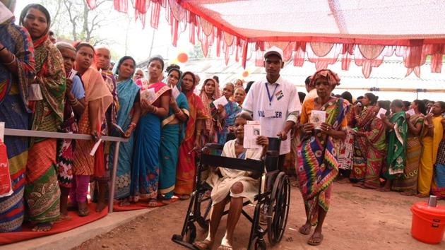 Voting for 35 assembly constituencies is also taking place in Odisha; here seen people from Phulbani tribe cast their vote in Kandhamal. Due to EVM malfunction the voting procedure was halted at booths 261 and 263 in Bolangir Lok Sabha constituency. (Arabinda Mahapatra / HT Photo)