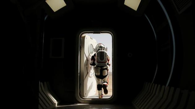 In the middle of China’s Gobi desert sits a Mars base simulator, but instead of housing astronauts training to live on the Red Planet, the facility is full of teenagers on a school trip. Here seen is a staff member wearing a mock space suit stepping out of the Mars simulation base. (Thomas Peter / REUTERS)