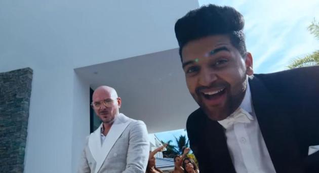 Guru Randhawa - Pitbull song Slowly Slowly has lyrics in English, Hindi and Spanish.