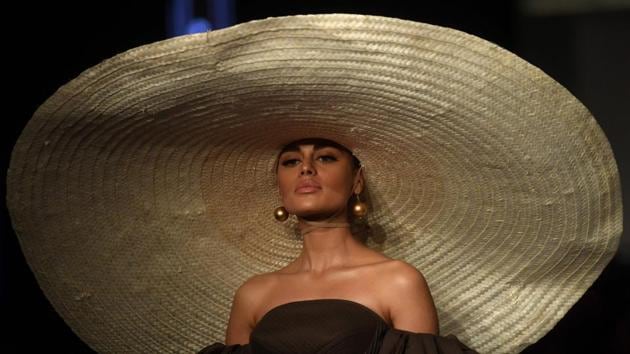 A model presents a creation by Pakistani designer Zaheer Abbas on the first day of the ‘Hum Showcase’ Fashion Week in Karachi, Pakistan. (Asif Hassan / AFP) 
