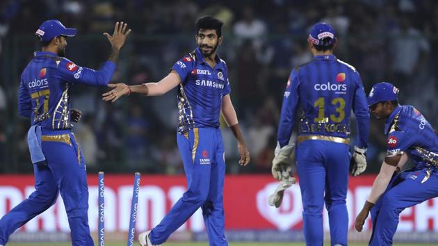 Jasprit Bumrah celebrates a wicket with his teammates. (AP)