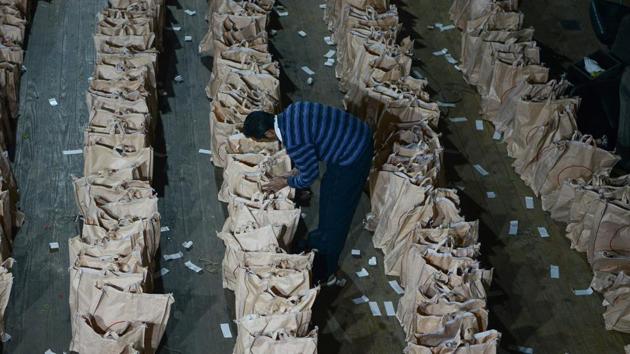 A polling official arranges materials which will be used for elections at a voting distribution point in Darjeeling, West Bengal. (Diptendu Dutta / AFP) A polling official arranges materials which will be used for elections at a voting distribution point in Darjeeling, West Bengal. (Diptendu Dutta / AFP)