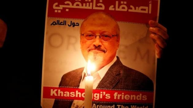 A demonstrator holds a poster with a picture of Saudi journalist Jamal Khashoggi outside the Saudi Arabia consulate in Istanbul, Turkey (REUTERS File)