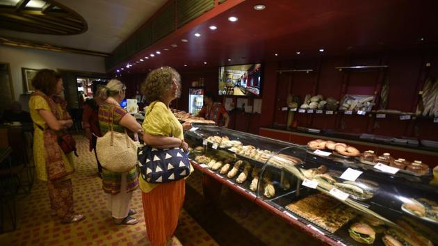 Croissants and baguettes are still around, but a lot of places sell burgers and pizzas instead.(Biplov Bhuyan/HT PHOTO)