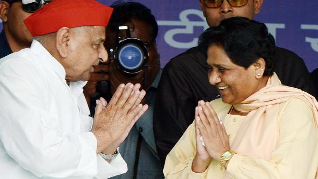 Bahujan Samaj Party (BSP) chief Mayawati and Samajwadi Party (SP) patriarch Mulayam Singh Yadav — bitter political rivals for over two decades — sat together on stage in Mainpuri on Friday. (HT file photo) Bahujan Samaj Party (BSP) chief Mayawati and Samajwadi Party (SP) patriarch Mulayam Singh Yadav — bitter political rivals for over two decades — sat together on stage in Mainpuri on Friday. (HT file photo)