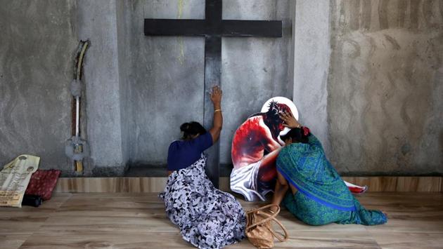 Women pray inside a church ahead of Good Friday celebrations in Kolkata, West Bengal. (Rupak De Chowdhuri / REUTERS) Women pray inside a church ahead of Good Friday celebrations in Kolkata, West Bengal. (Rupak De Chowdhuri / REUTERS)