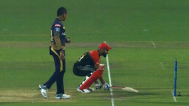 Virat Kohli gets back into his crease as Sunil Narine looks on.(IPL/ Twitter)