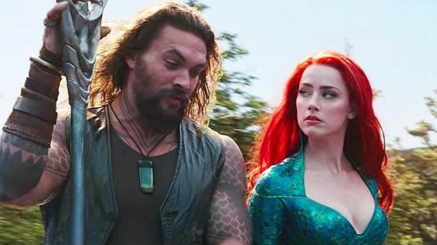 Amber Heard and Jason Momoa in a still from Aquaman.