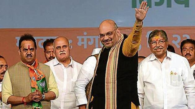 Shah was addressing a well-attended poll rally in support of the BJP candidate Kanchan Kul at the Sharada grounds in Baramati.(HT Photo)