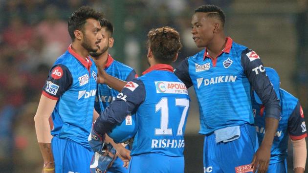 Delhi Capitals team players celebrate after the fall of a wicket. (AFP) Delhi Capitals team players celebrate after the fall of a wicket. (AFP)