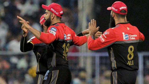 Royal Challengers Bangalore's Virat Kohli and others celebrate victory over Kolkata Knight Riders. (AP) Royal Challengers Bangalore's Virat Kohli and others celebrate victory over Kolkata Knight Riders. (AP)