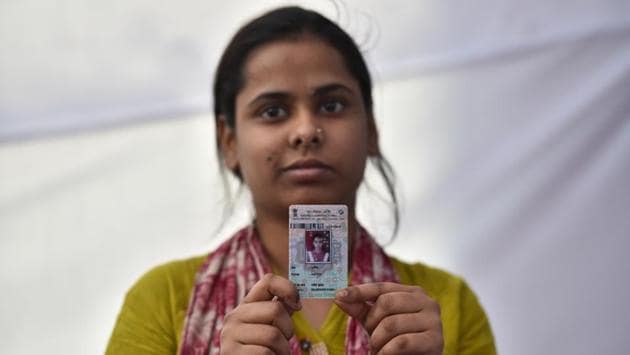 Kavita, an 18-year-old first time voter shows her newly received voter-ID card in braille. (Sanchit Khanna / HT Photo)