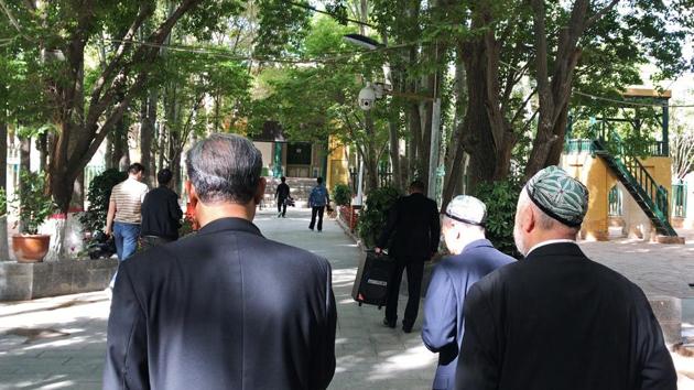 Outside the main mosque in Kashgar, where a surveillance camera looks on(Bloomberg)