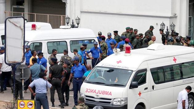 Sri Lankan military officials stand guard in front of the St. Anthony's Shrine after an explosion in Colombo on Sunday. (REUTERS PHOTO) Sri Lankan military officials stand guard in front of the St. Anthony's Shrine after an explosion in Colombo on Sunday. (REUTERS PHOTO)