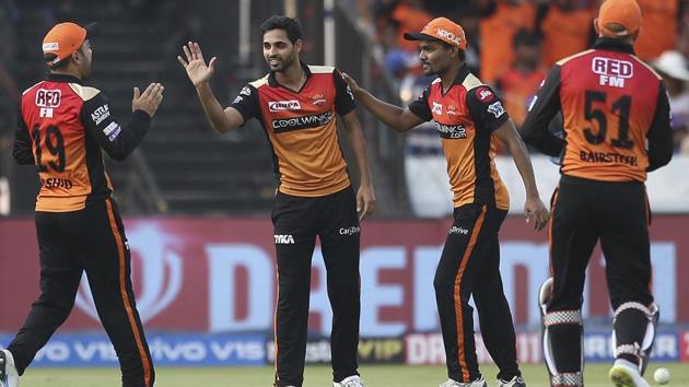Sunrisers Hyderabad's bowler Bhuvneshwar Kumar, second from left, celebrates the dismissal of Andre Russell. (AP) Sunrisers Hyderabad's bowler Bhuvneshwar Kumar, second from left, celebrates the dismissal of Andre Russell. (AP)