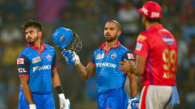 Delhi Capitals' cricketer Shikhar Dhawan (C) gestures towards the dressing room as his team mate Shreyas Iyer (L) looks on. (AFP) Delhi Capitals' cricketer Shikhar Dhawan (C) gestures towards the dressing room as his team mate Shreyas Iyer (L) looks on. (AFP)
