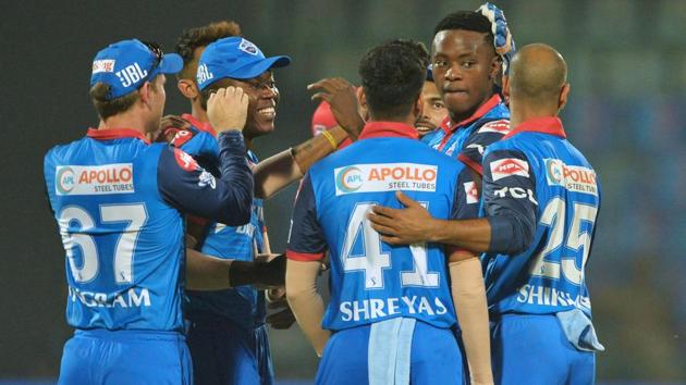 Delhi Capitals bowler Kagiso Rabada (2R) celebrates with his teammates after he dismissed Kings XI Punjab cricketer Mayank Agarwal. (AFP)