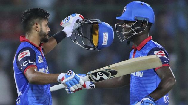 Delhi Capitals captain Shreyas Iyer, left, embraces his teammate Sherfane Rutherford after scoring winning runs.(AP)