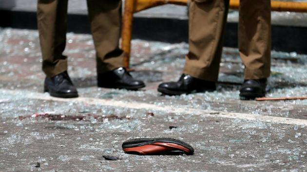 A shoe of a victim is seen in front of the St. Anthony's Shrine. Among the 45 bodies at the Colombo National Hospital there are nine foreigners, they said, adding that Americans and British citizens were among the dead. (REUTERS) A shoe of a victim is seen in front of the St. Anthony's Shrine. Among the 45 bodies at the Colombo National Hospital there are nine foreigners, they said, adding that Americans and British citizens were among the dead. (REUTERS)