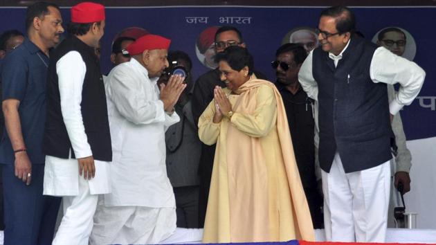 Samajwadi Party (SP) leader Mulayam Singh Yadav, center left, and Bahujan Samaj Party chief Mayawati, center right, greet each other watched by SP President Akhilesh Yadav, second left, at a joint election rally in Mainpuri (File) Samajwadi Party (SP) leader Mulayam Singh Yadav, center left, and Bahujan Samaj Party chief Mayawati, center right, greet each other watched by SP President Akhilesh Yadav, second left, at a joint election rally in Mainpuri (File)
