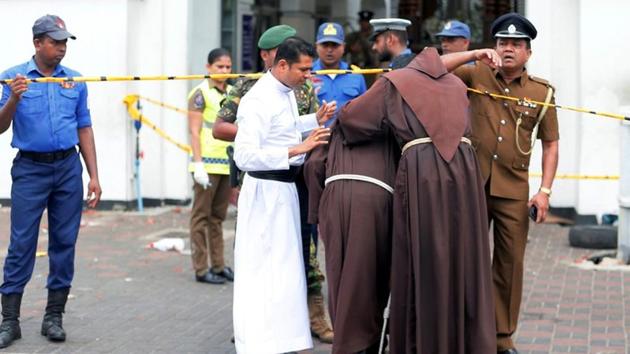 Priests walk into the St. Anthony's Shrine, Kochchikade church after an explosion in Colombo, Sri Lanka April 21, 2019. (REUTERS FILE PHOTO) Priests walk into the St. Anthony's Shrine, Kochchikade church after an explosion in Colombo, Sri Lanka April 21, 2019. (REUTERS FILE PHOTO)