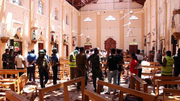 Sri Lankan security personnel walk through debris following an explosion in St Sebastian's Church in Negombo, north of the capital Colombo, on April 21, 2019. (AFP photo) Sri Lankan security personnel walk through debris following an explosion in St Sebastian's Church in Negombo, north of the capital Colombo, on April 21, 2019. (AFP photo)