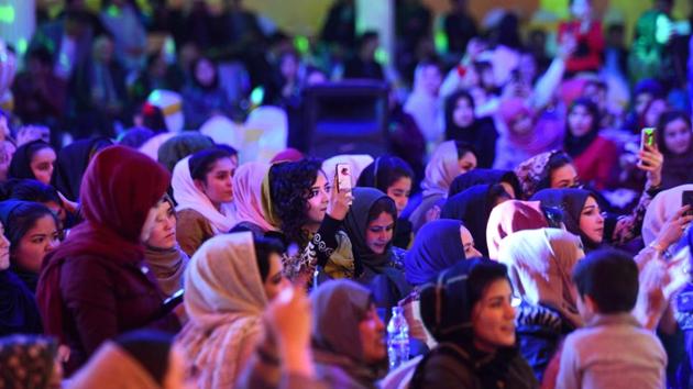 Afghan women watch a performance by Afghan singer Seeta Qasemi during a concert in Mazar-i-Sharif. A second summit between Afghan delegates and the insurgents that was to take place in Doha this weekend and had been set to include more women has been postponed indefinitely. International observers have blasted the talks, led on the US side by peace envoy Zalmay Khalilzad, for their lack of female inclusion. (Farshad Usyan / AFP) Afghan women watch a performance by Afghan singer Seeta Qasemi during a concert in Mazar-i-Sharif. A second summit between Afghan delegates and the insurgents that was to take place in Doha this weekend and had been set to include more women has been postponed indefinitely. International observers have blasted the talks, led on the US side by peace envoy Zalmay Khalilzad, for their lack of female inclusion. (Farshad Usyan / AFP)