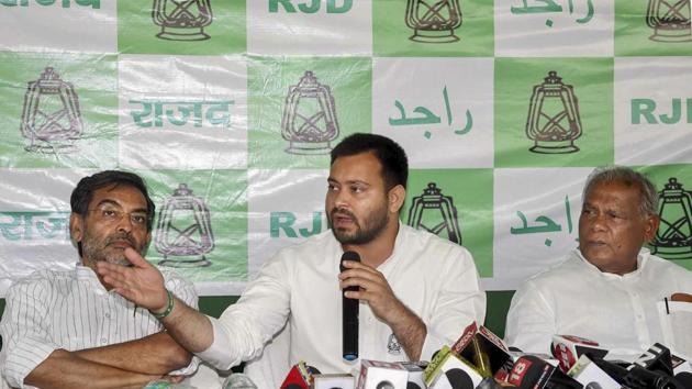 Rashtriya Janata Dal (RJD) leader Tejashwi Yadav with Hindustani Awam Morcha (Secular) President Jitan Ram Manjhi and Rashtriya Lok Samata Party Chief (RLSP) Upendra Kushwaha during a grand alliance press conference at RJD office, in Patna, Monday, April 22, 2019. (PTI) Rashtriya Janata Dal (RJD) leader Tejashwi Yadav with Hindustani Awam Morcha (Secular) President Jitan Ram Manjhi and Rashtriya Lok Samata Party Chief (RLSP) Upendra Kushwaha during a grand alliance press conference at RJD office, in Patna, Monday, April 22, 2019. (PTI)