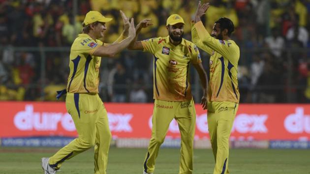 Chennai Super Kings Ravindra Jadeja, right, Shane Watson, left and Imran Tahir celebrate the wicket. (AP)