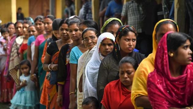 Women line up to cast their votes at a polling station during the second phase of the voting in Patidarang village, 60km from Guwahati.(AFP file photo)